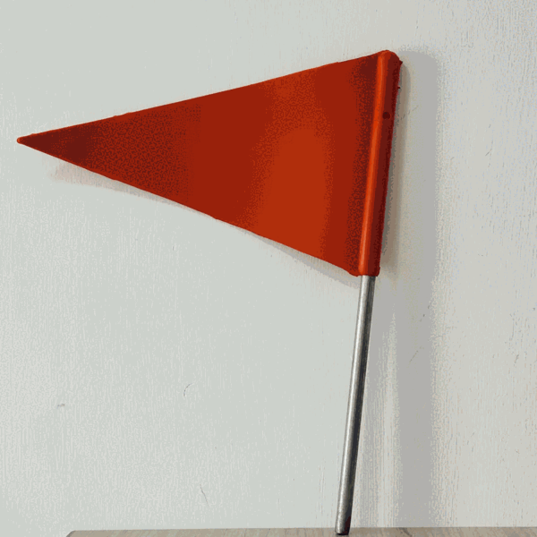 Foto real (no IA) de banderola para exceso de dimensiones